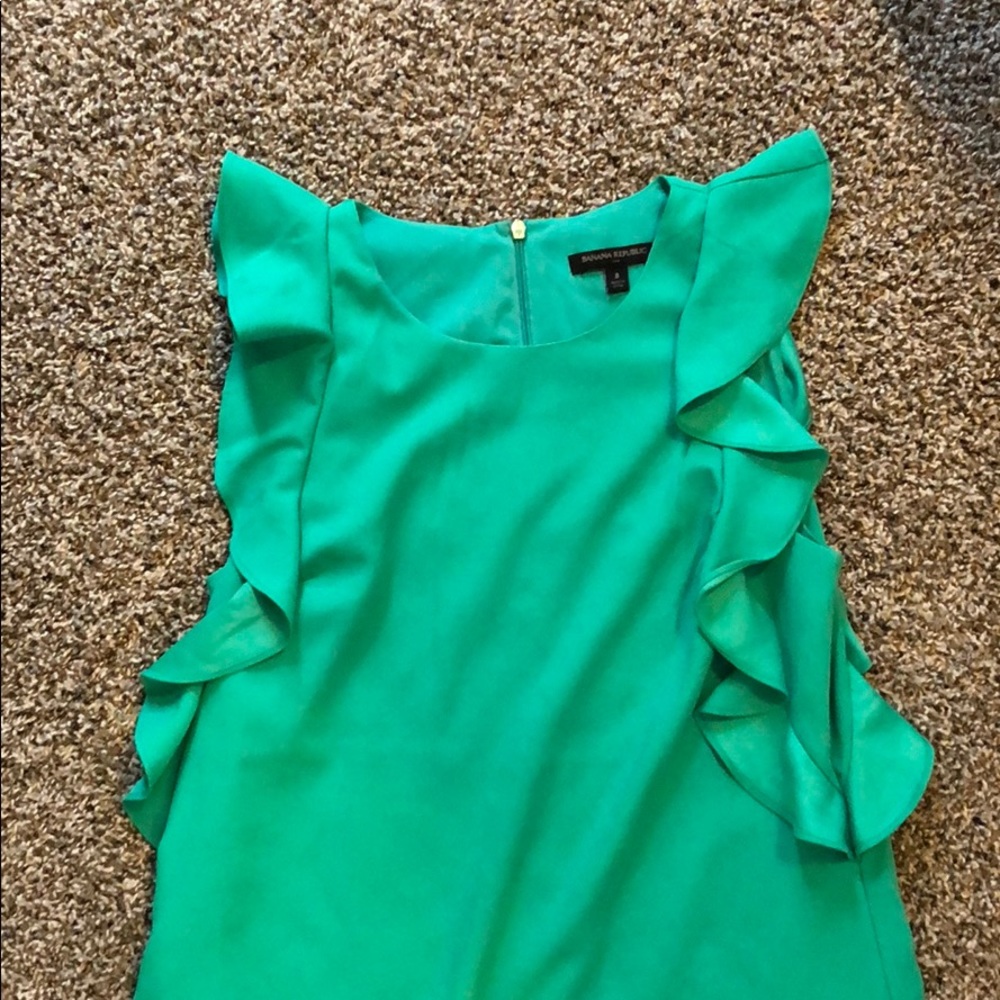 OBSESSED with the color AND SLEEVES of this dress